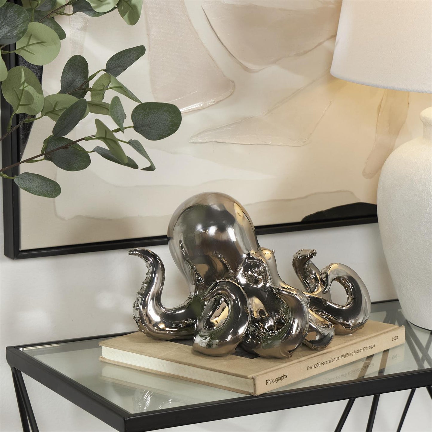 silver ceramic octopus sculpture with Textured Tentacle