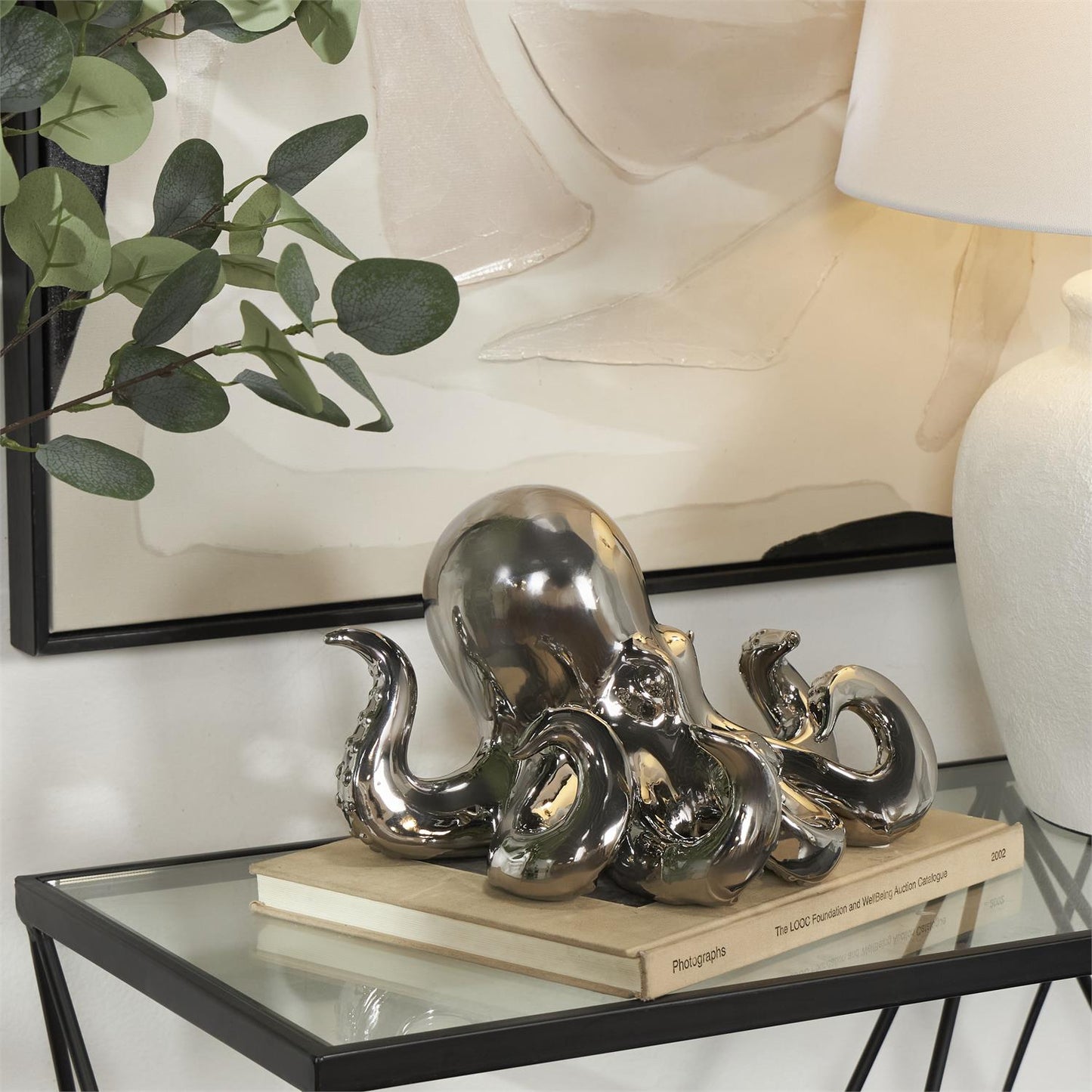silver ceramic octopus sculpture with Textured Tentacle