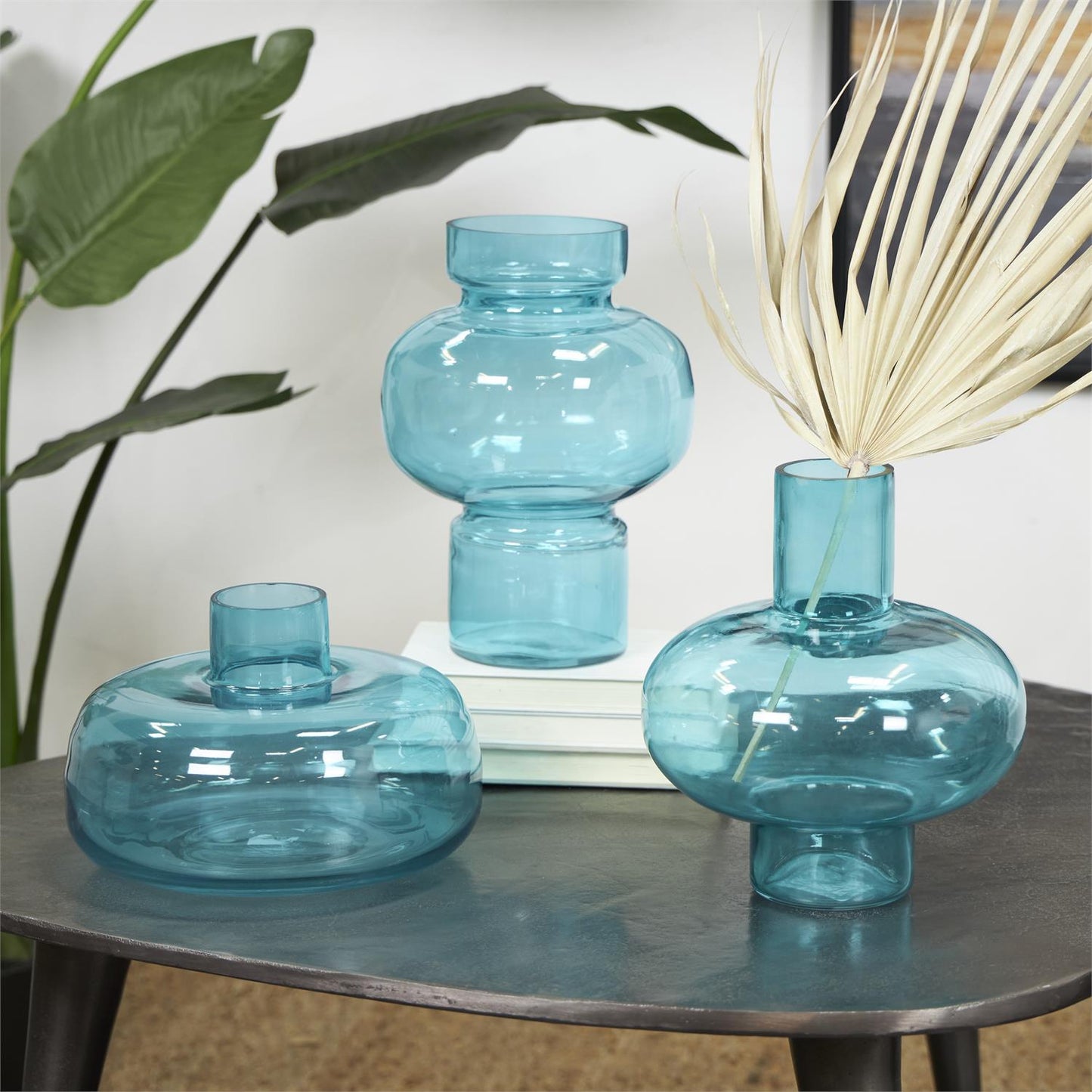 Blue Glass Round Vase with Varying Shapes and Sizes