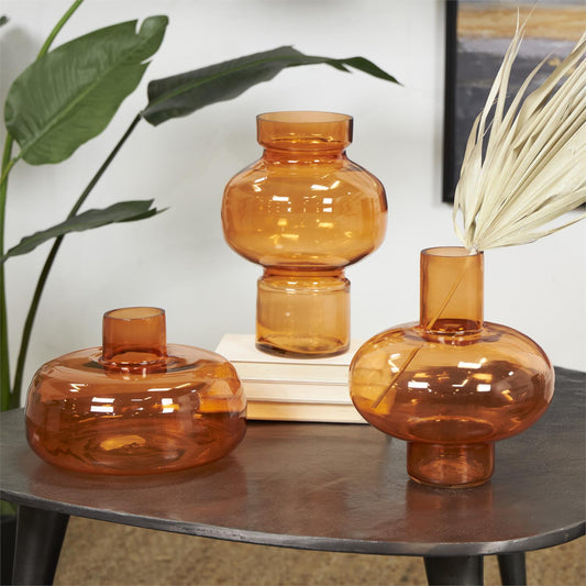 Orange Glass Round Vase with Varying Shapes and Sizes