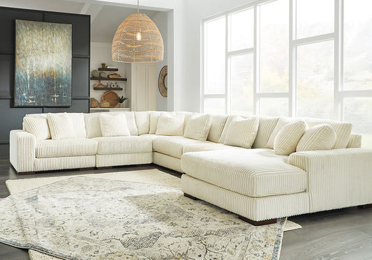 Libby Ivory 6PC Sectional with Reversible Chaise.